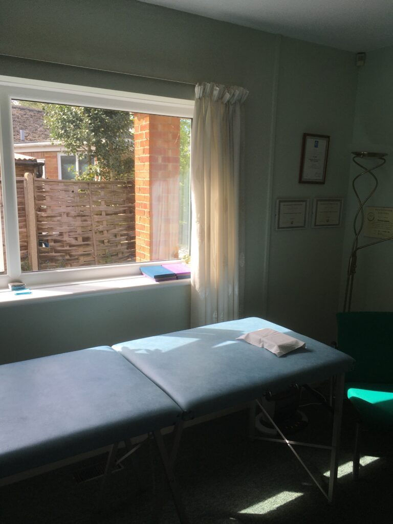 Alexander Technique teaching table in clinic therapy room 